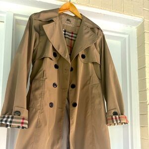 Beige Burberry trench coat